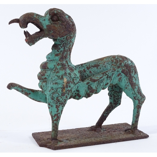 146 - A verdigris cast-iron ornamental dragon, length 24cm, height 24cm