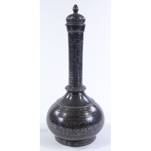 152 - An Oriental silvered metal narrow necked vase and cover, height 34cm