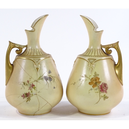 159 - A pair of Royal Worcester ewers with painted floral and gilded decoration, pattern no. 1668, registe... 