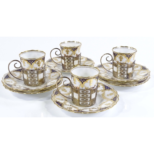 160 - A set of 4 Aynsley gilded china coffee cups and saucers, in silver holders