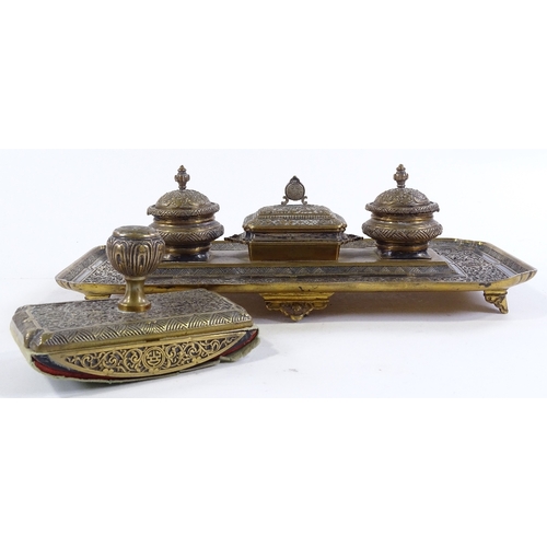 165 - A Continental brass desk stand with inkwells and matching blotter, width 34cm