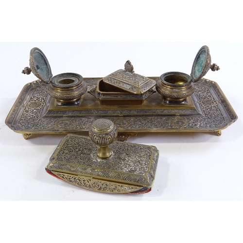 165 - A Continental brass desk stand with inkwells and matching blotter, width 34cm