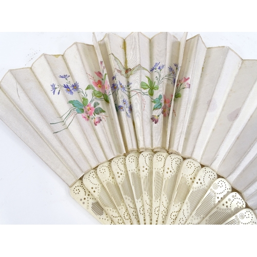 179 - A 19th century carved bone fan with hand painted silk screen, length 26cm