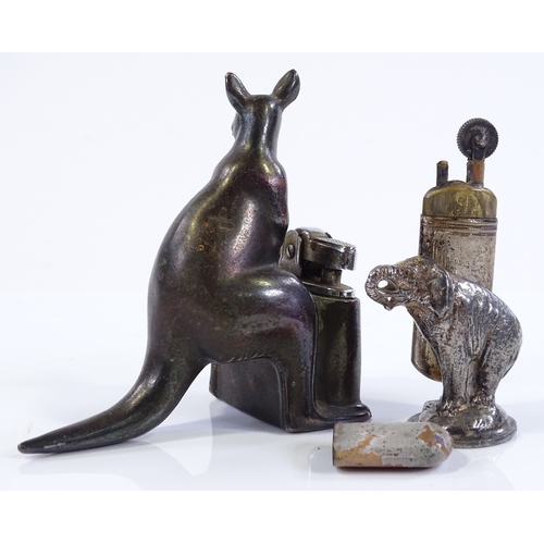 183 - A novelty kangaroo design table lighter, height 9cm, and an electroplate elephant design table light... 