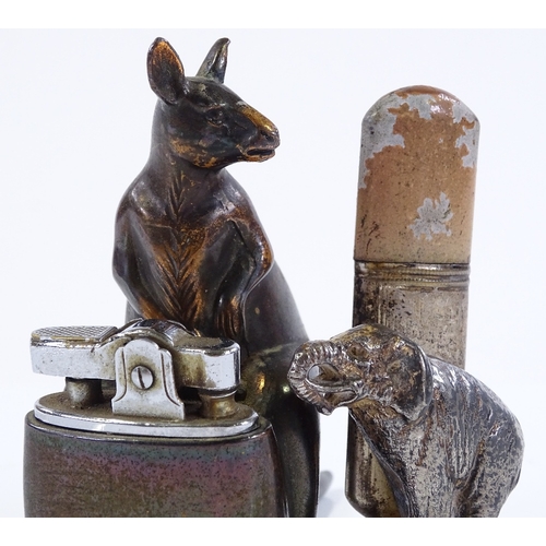 183 - A novelty kangaroo design table lighter, height 9cm, and an electroplate elephant design table light... 