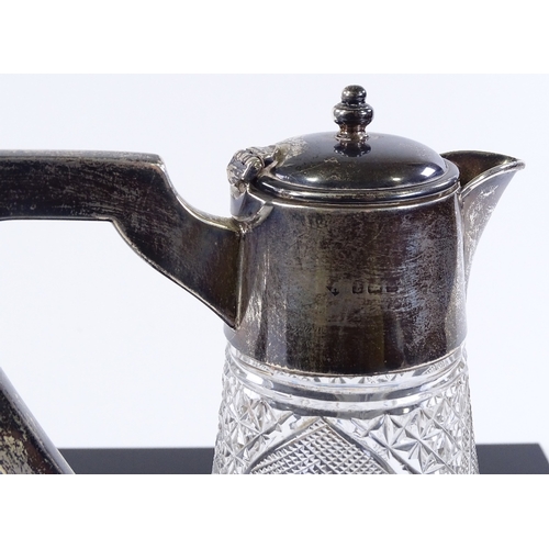 187 - An Edwardian cut-glass and silver-mounted claret jug, hallmarks Birmingham 1910, height 24cm