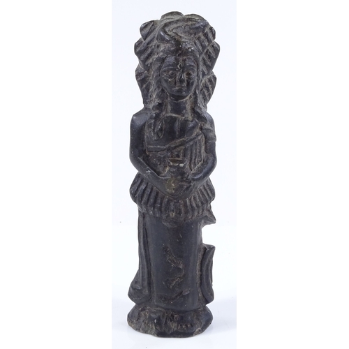 55 - An unusual carved stone tribal figure, height 14cm