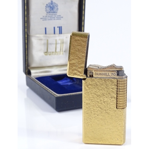 62 - A Dunhill gold plated pocket lighter, boxed