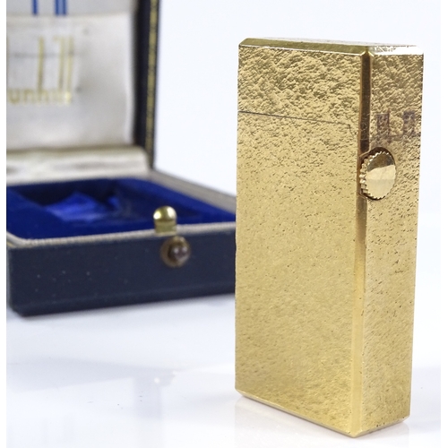 62 - A Dunhill gold plated pocket lighter, boxed