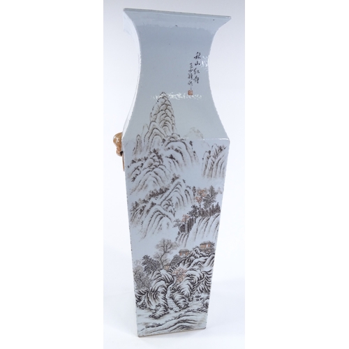 66 - A Chinese porcelain square section vase with painted mountain landscape and text, height 57cm, rim d... 