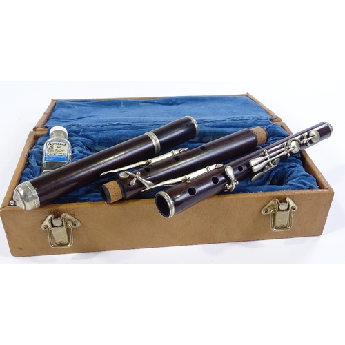 72 - A rosewood and nickel plate 3-section flute, cased