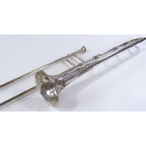 75 - A Victorian silver plated trombone made by Joseph Higham of Manchester, with engraved decoration and... 