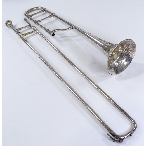 75 - A Victorian silver plated trombone made by Joseph Higham of Manchester, with engraved decoration and... 