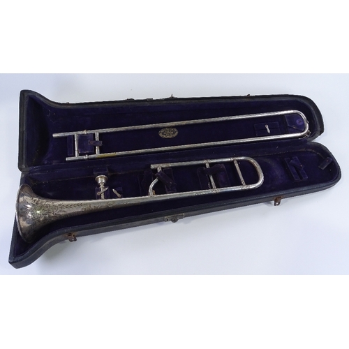 75 - A Victorian silver plated trombone made by Joseph Higham of Manchester, with engraved decoration and... 