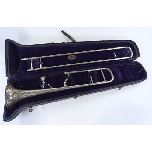 75 - A Victorian silver plated trombone made by Joseph Higham of Manchester, with engraved decoration and... 