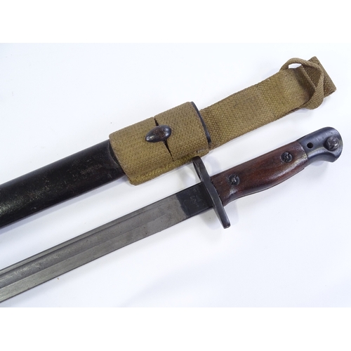 93 - A First War Period Wilkinson's 1907 pattern sword bayonet, original leather scabbard, blade length 4... 