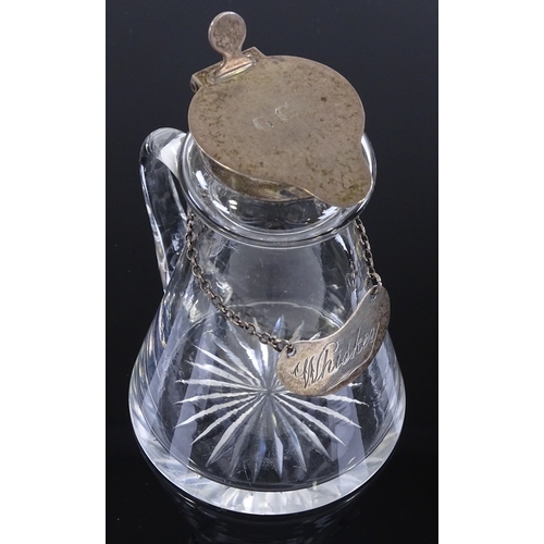 99 - A glass whisky noggin with silver mount, by Goldsmiths & Silversmiths Co Birmingham 1913, height 9cm... 