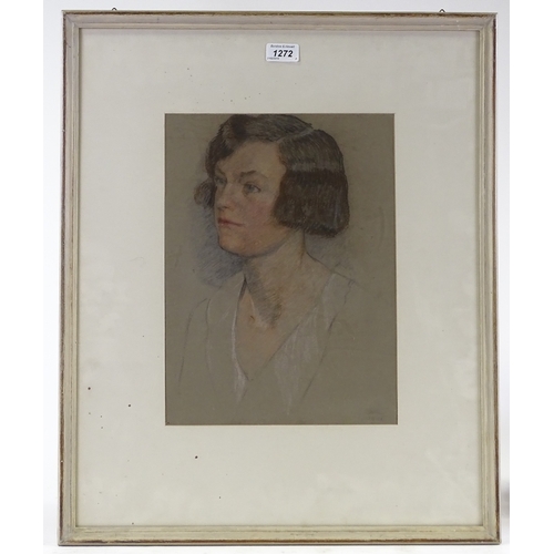 1272 - Early 20th century crayon / charcoal on grey paper, portrait of a young woman, indistinctly signed, ... 