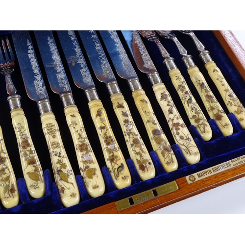 200 - A superb quality set of mid-19th century ivory Shibayama-handled dessert knives and forks for 12 peo... 