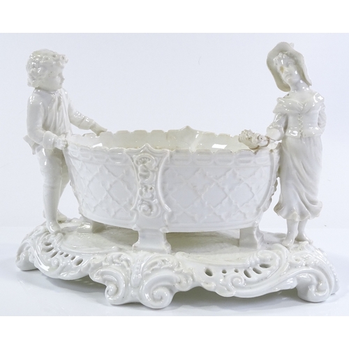 201 - A Victorian Moore Brothers ceramic table centre basket, flanked by 2 children figures, length 29cm, ... 