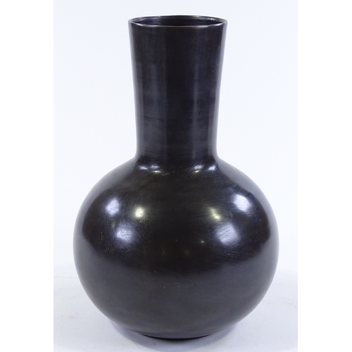 205 - A Studio bronze narrow-necked vase, unsigned, height 31cm