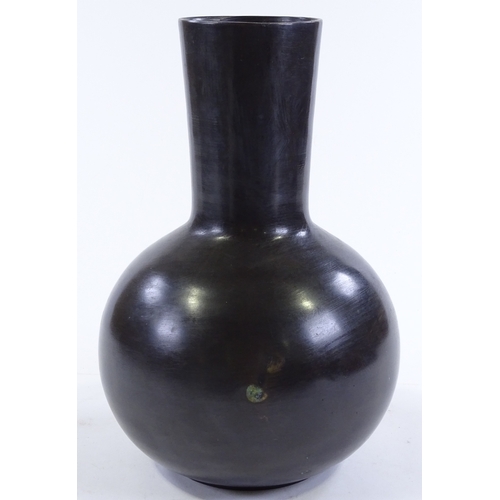 205 - A Studio bronze narrow-necked vase, unsigned, height 31cm