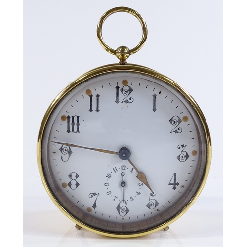 207 - A Victorian brass drum-cased travelling alarm clock, with enamel dial, striking on a bell, diameter ... 