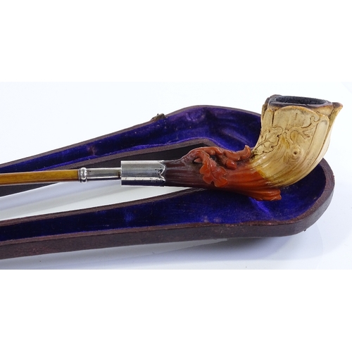 208 - A 19th century silver-mounted carved Meerschaum pipe, length 43cm, in original leather case