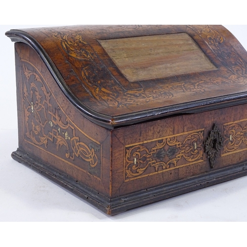 217 - An 18th century Dutch marquetry and walnut desktop box, with serpentine-shaped lid and boxwood and i... 