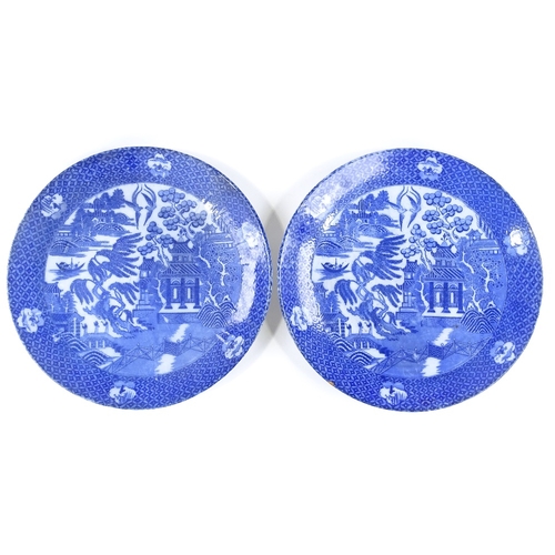 227 - A pair of Chinese blue and white transfer decorated chargers, diameter 40cm