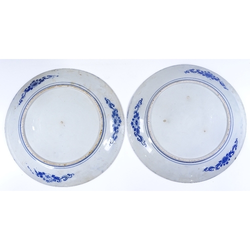 227 - A pair of Chinese blue and white transfer decorated chargers, diameter 40cm