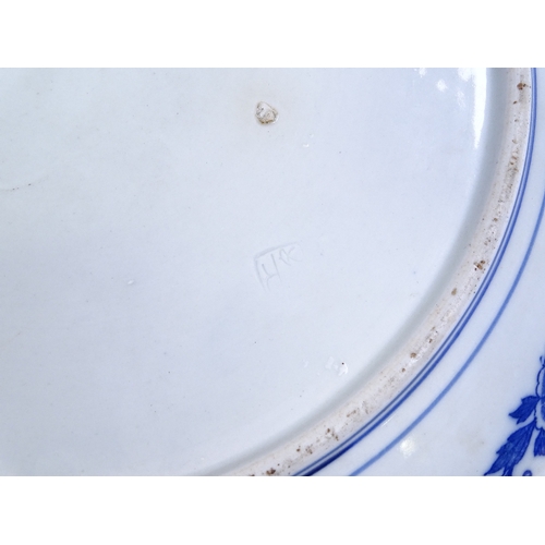 227 - A pair of Chinese blue and white transfer decorated chargers, diameter 40cm