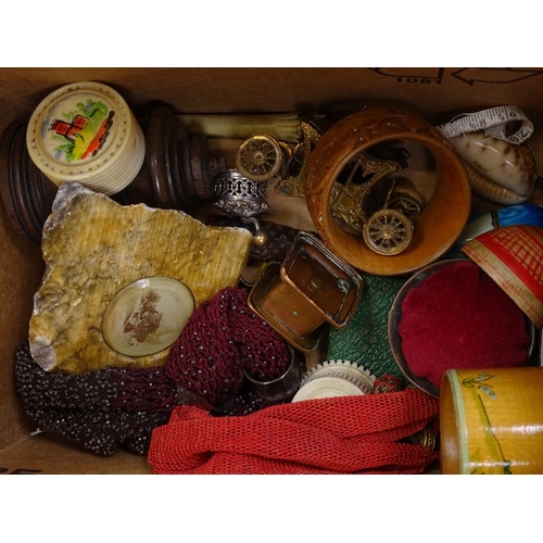 103 - A mixed box of items, including napkin rings, misers purses, a carved bone elephant design vase etc