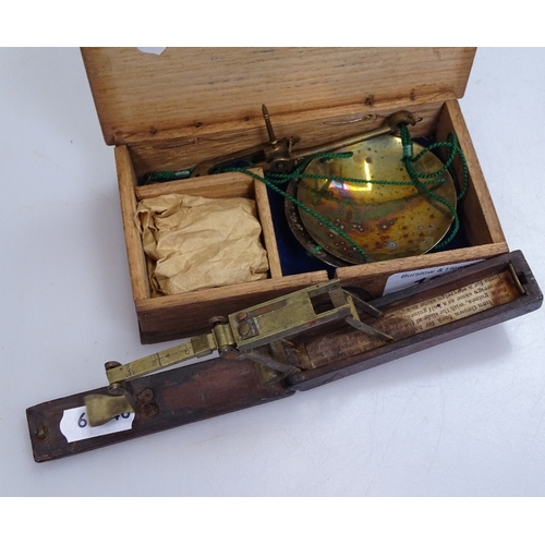 104 - Victorian brass and mahogany travelling sovereign scales, and a cased set of brass Apothecary scales... 