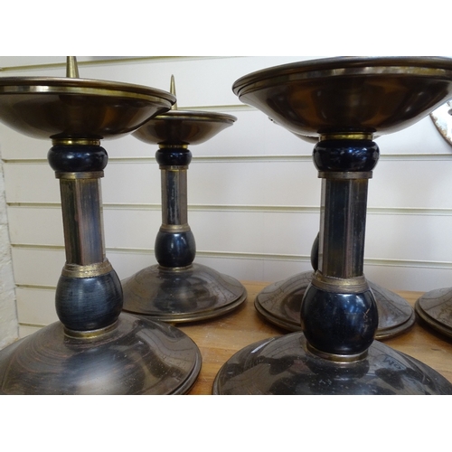 47 - A set of 6 Art Deco patinated brass pricket candle stands, height 25cm