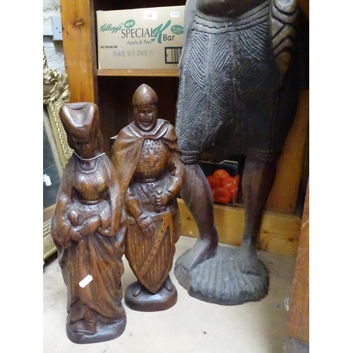 55 - A large carved hardwood African figure, height 40