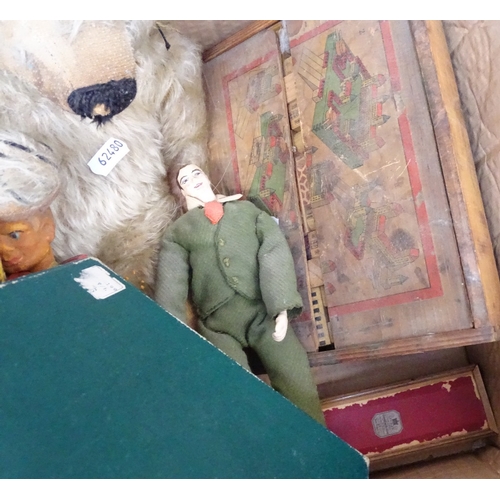 64 - A group of Vintage toys, including a straw-filled teddy bear, a George VI Coronation puzzle etc