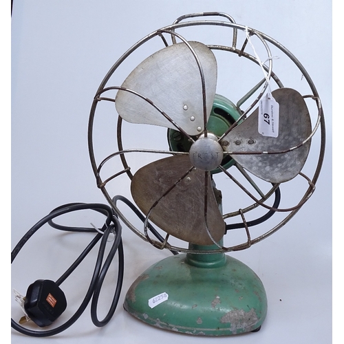 67 - A Vintage Frost green-enamelled electric fan, height 14