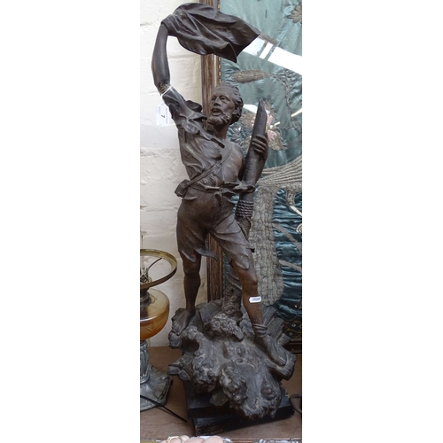 7 - A French spelter figure of Robinson Crusoe, overall height 34