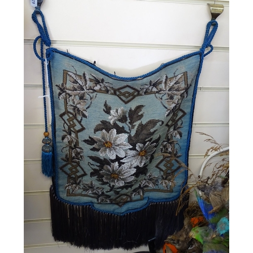 78 - A Victorian beadwork embroidered screen with tassel edge, overall height 23