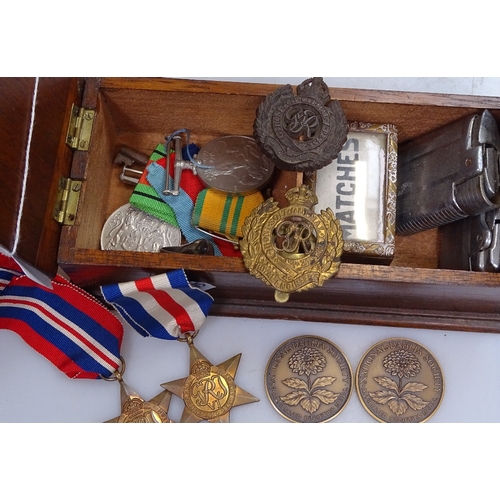 86 - A mixed box of items, including Second War Period medals, pocket lighters etc