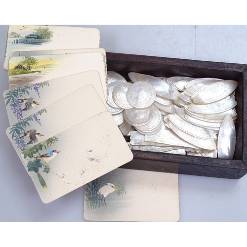 95 - A collection of Chinese engraved mother-of-pearl gaming counters, and a set of Japanese hand painted... 