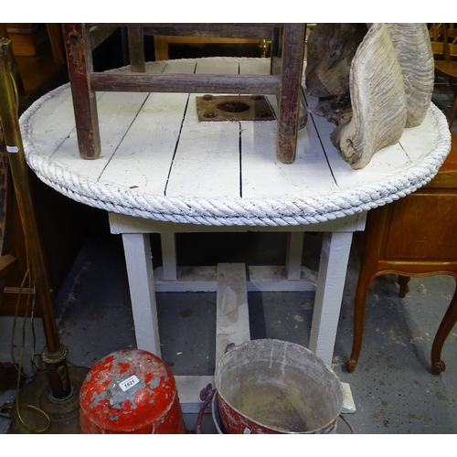 1816 - A circular white painted garden table, with rope twist edging, W105cm