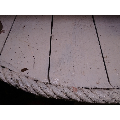 1816 - A circular white painted garden table, with rope twist edging, W105cm