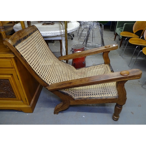 1823 - A hardwood and cane panelled plantation chair