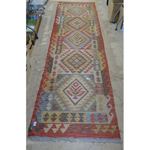 1826 - A wool Choli Kilim runner, 300cm x 76cm