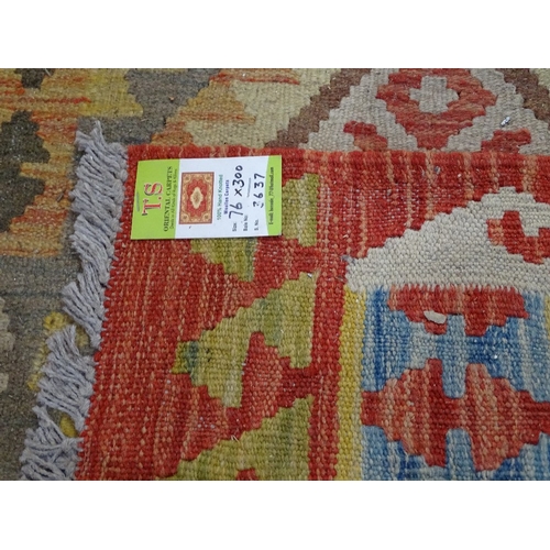 1826 - A wool Choli Kilim runner, 300cm x 76cm