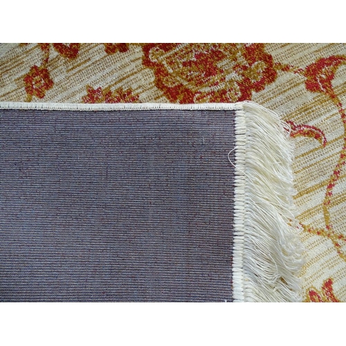 1827 - A beige ground Ziegler rug, 190cm x 140cm