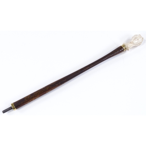 102 - An early 20th century rosewood parasol handle, with carved ivory woman's head terminal