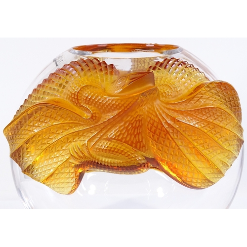 106 - A large modern Lalique clear glass bowl, with amber glass dragon design mounts, height 22cm, perfect... 